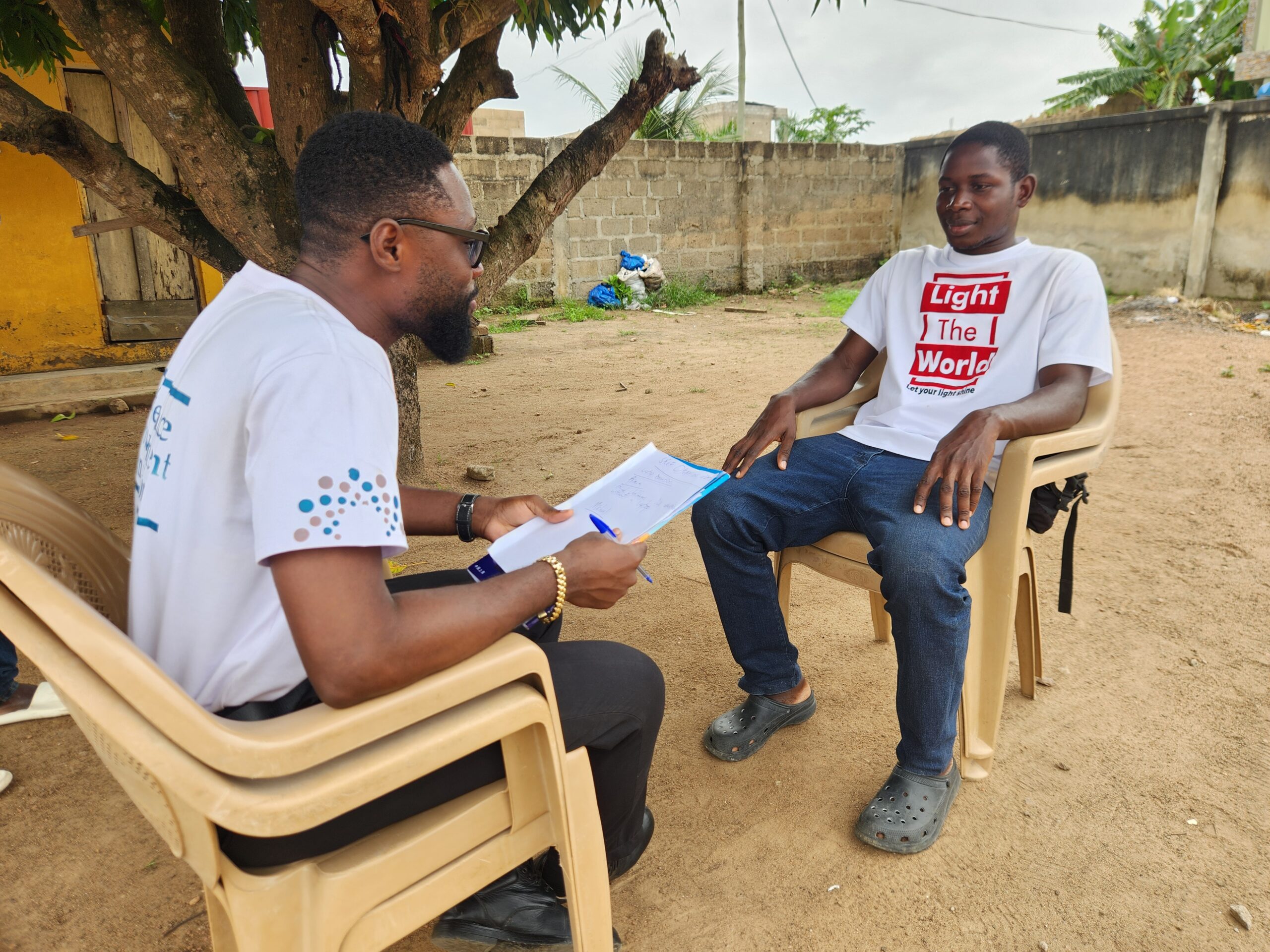 An SREF mentor meeting with beneficiaries in Ghana