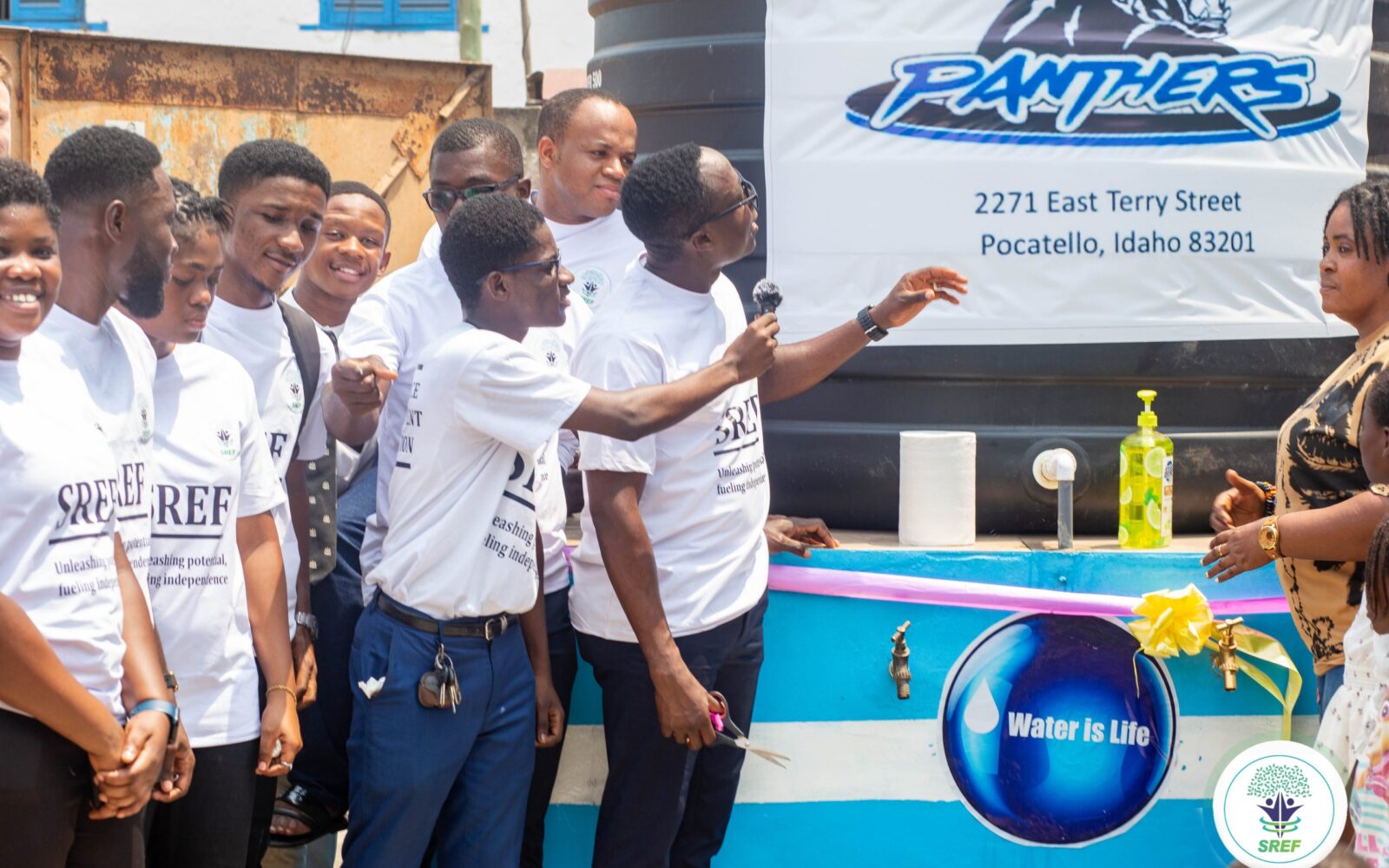 SREF team at the water tank ribbon-cutting